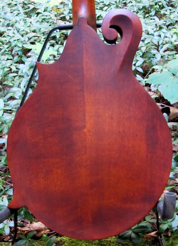 [Hand carved maple back]